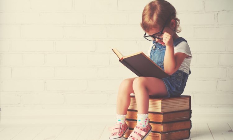 child reading books